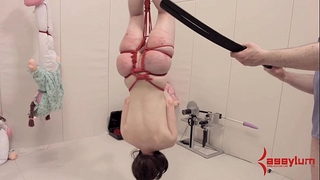 Anal masochist hung upside down and abased